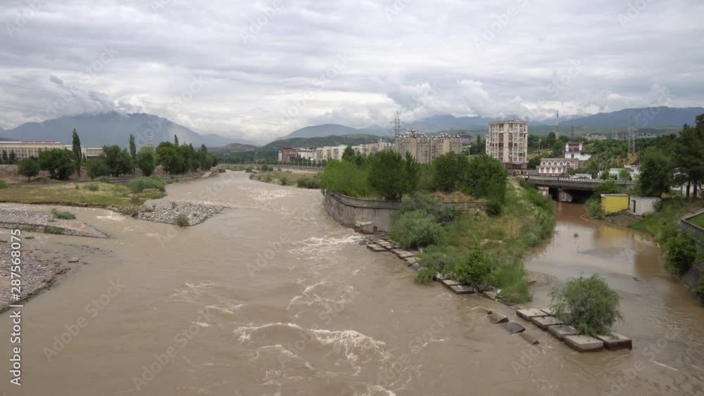 Dushanbe Streaming Varzob River View from the Ismoil Somoni Avenue Bridge on a Cloudy Rainy Day Dushanbe Streaming Varzob River View from the Ismoil Somoni Avenue Bridge on a Cloudy Rainy Day