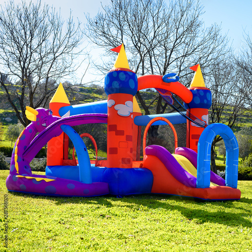 Fotografie Inflatable castle outdoor at sunny summer day.