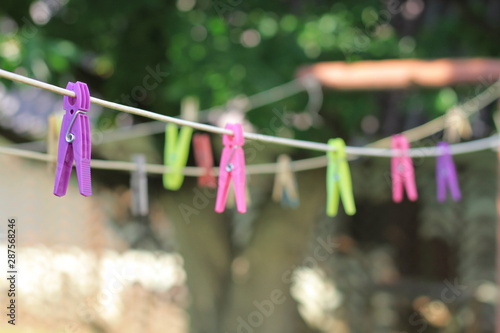 rope with color linen clips in the garden