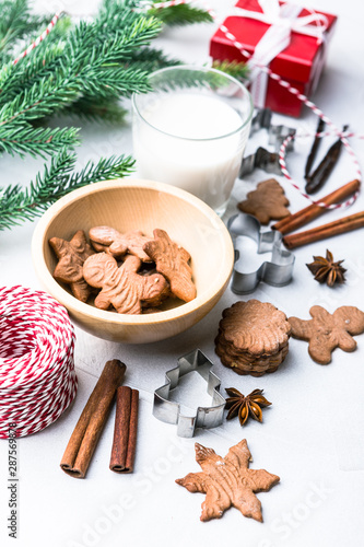 Christmas gingerbread cookies with glass of milk