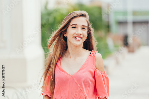 Photos Outdoor portrait of 12 years old girl with long hair