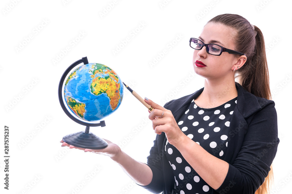 Woman holding globe and pointing on it isolated on white Woman holding globe and pointing on it isolated on white