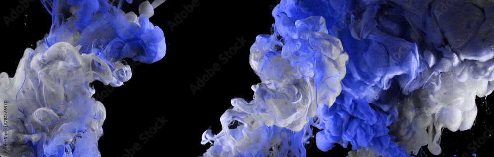 Fototapeta premium Acrylic blue colors in water. Ink blot. Abstract black background.