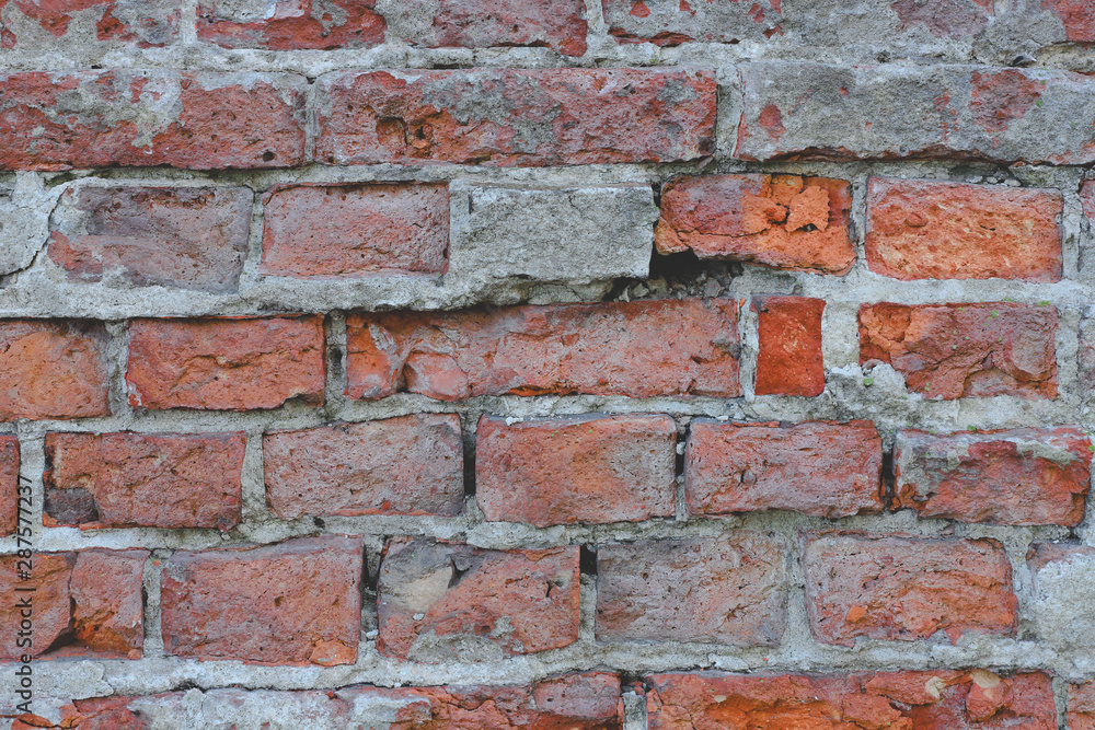 Fototapeta premium Grey sandstone, decorative stone, building and house wall