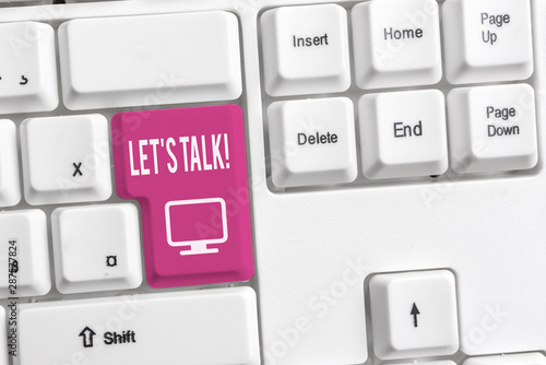 Conceptual hand writing showing Let S Talk. Concept meaning they are suggesting beginning conversation on specific topic White pc keyboard with note paper above the white background photo