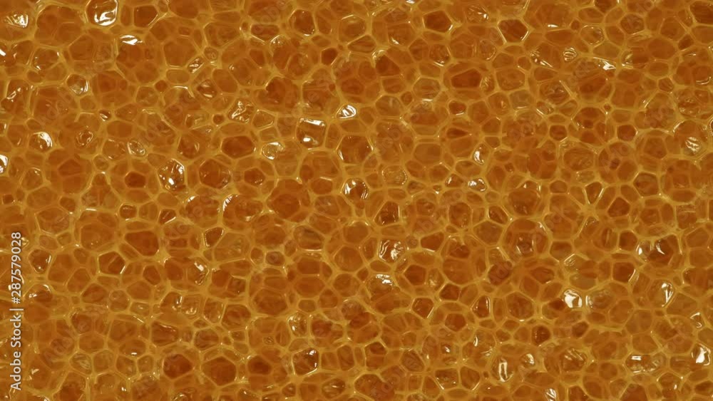 Close up of yellow orange foam sponge as background Close up of yellow orange foam sponge as background