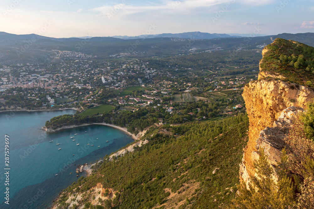 Cap Canaille cliffs overlooking Gulf of Cassis at Mediterranean Sea coast of French riviera at sunset light