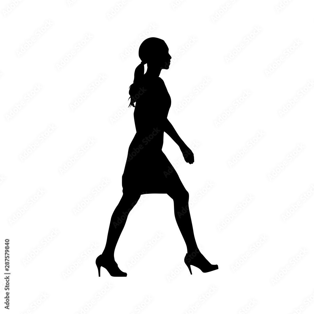 Woman walking, side view. Isolated vector silhouette. Young businesswoman in formal clothing