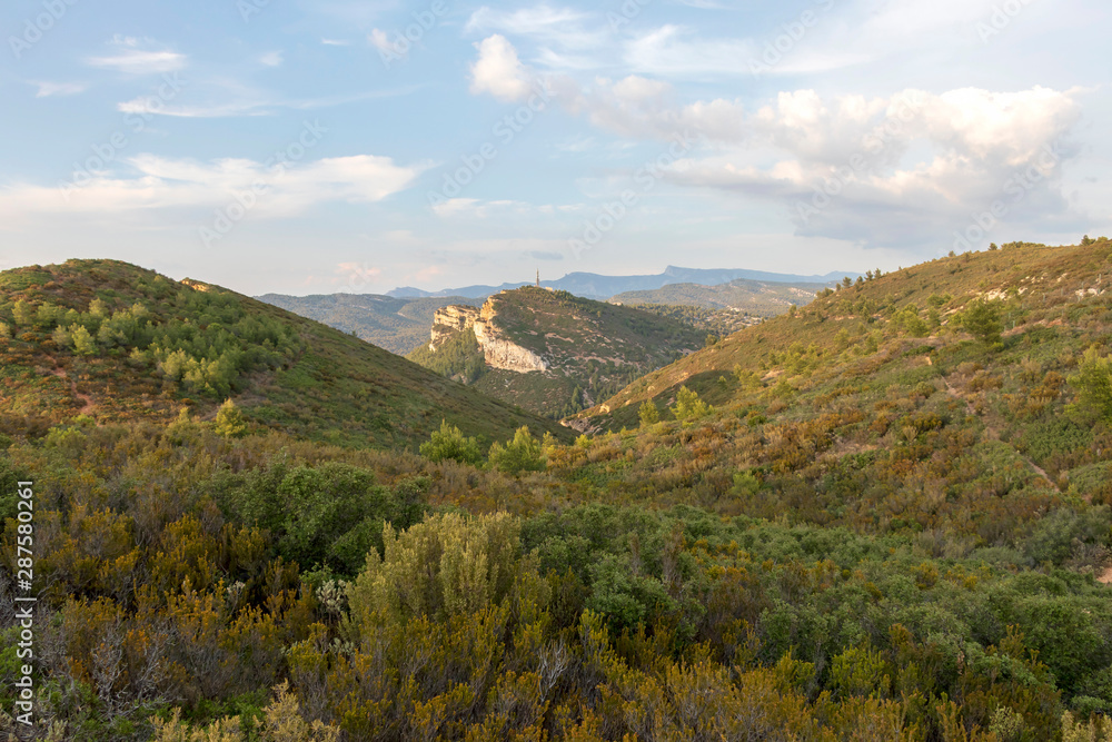Sandstone cliffs and green forest of Cap Canaille, Falaises Soubeyranes, Southern France Sandstone cliffs and green forest of Cap Canaille, Falaises Soubeyranes, Southern France