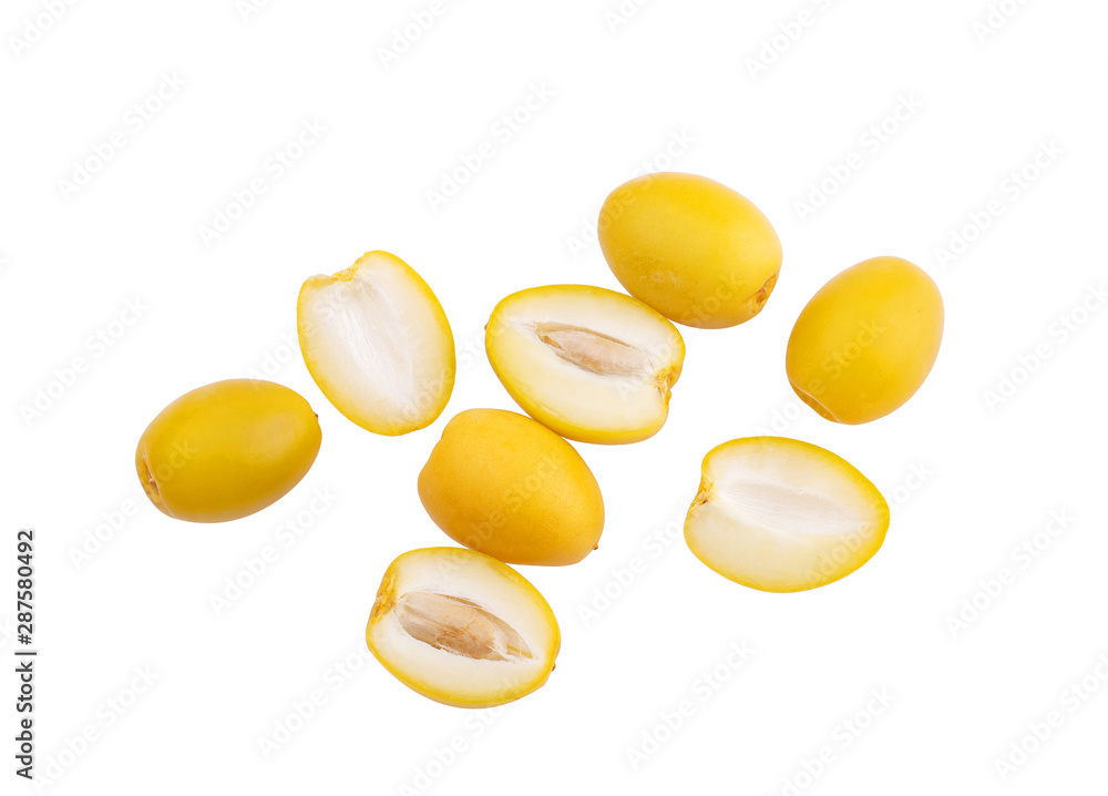 yellow date palm fruit on white background
