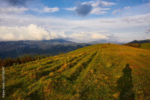 tourism day, travel. beautiful landscape of the mountains with clouds on the sky.