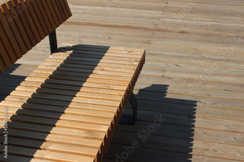 Wooden bench on a decking