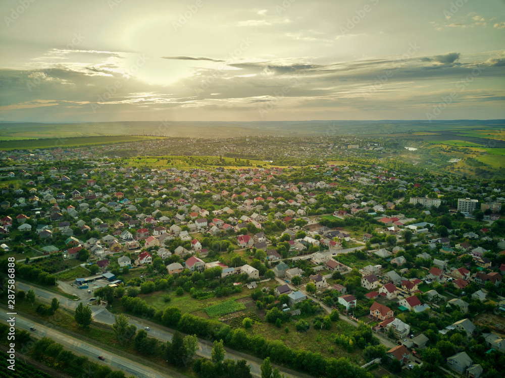Aerial View of suburban Houses in sunset