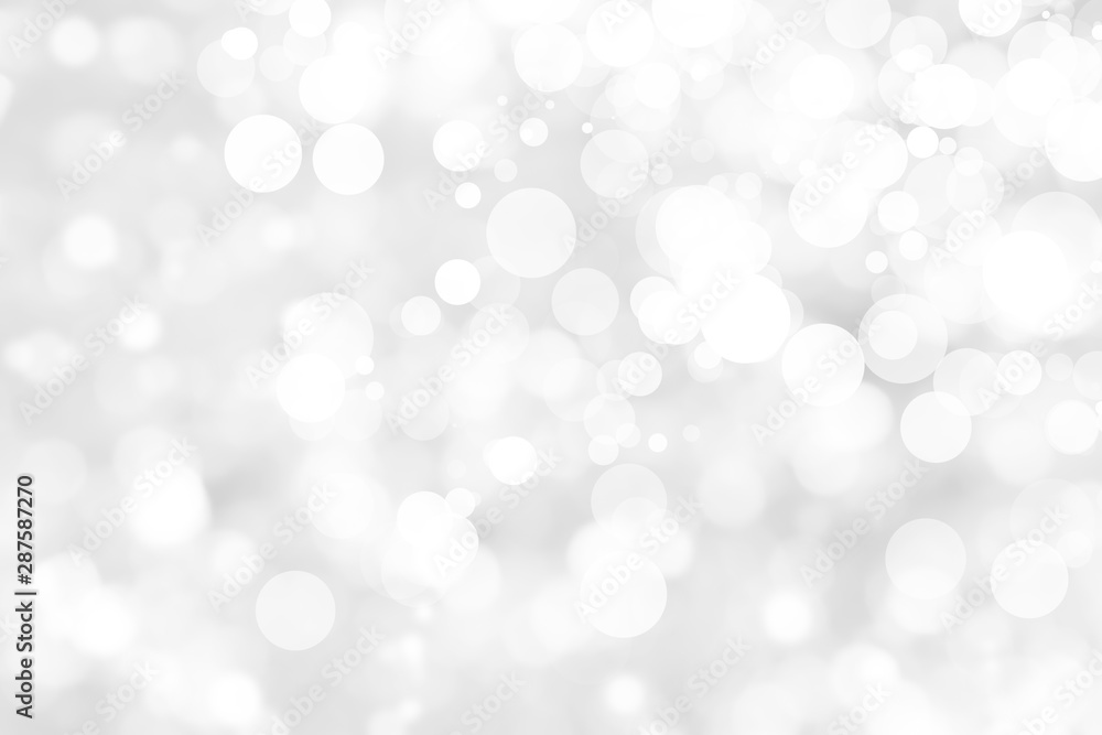 Abstract background with White bokeh on gray background. christmas blurred beautiful shiny Christmas lights. Abstract background with White bokeh on gray background. christmas blurred beautiful shiny Christmas lights.