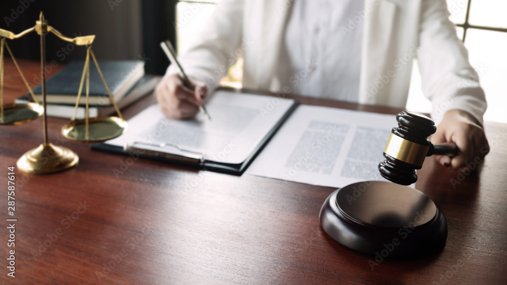 Justice and Agreement concept, Business advisor or Lawyers consultant working with contract in law firm. Justice and Agreement concept, Business advisor or Lawyers consultant working with contract in law firm.