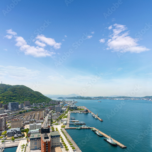 Aerial view Mojiko Retro Town, Kitakyushu cityscape and blue sky and cloud,  Kyushu, Japan. photo