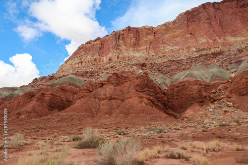 Capitol Reef National Park landscape of red, pink, grey and white barren hillside