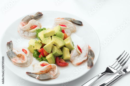 prawn marinated in lime juice  with avocado and pico de gallo on white back  photo