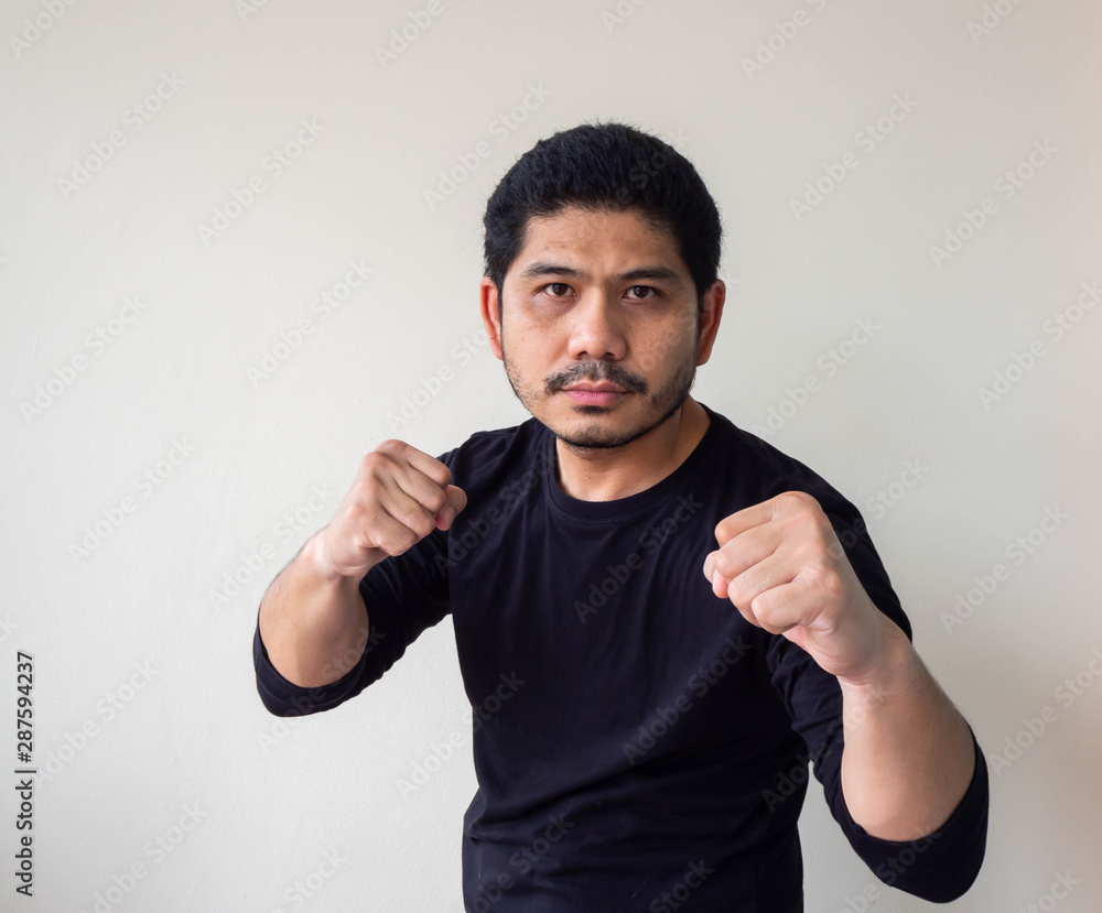 Asian man doing fighting stance. Young man with box stance ready to ...