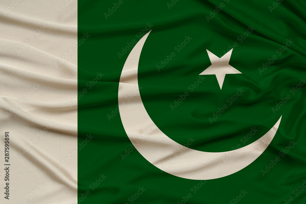 beautiful photo of the national flag of Pakistan on delicate shiny silk with soft draperies, the concept of state power, country life, horizontal, close-up, copy space beautiful photo of the national flag of Pakistan on delicate shiny silk with soft draperies, the concept of state power, country life, horizontal, close-up, copy space