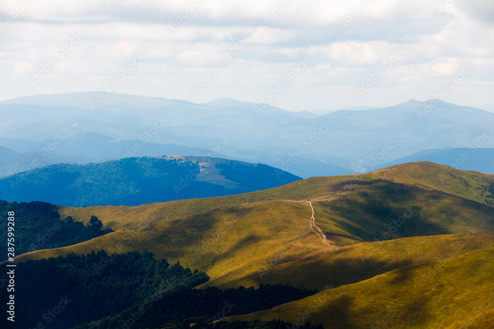 Landscape of Borzhava ridge of the Ukrainian Carpathian Mountains. Clouds above Carpathians.