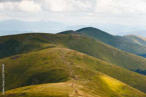Beautiful landscape of Borzhava ridge with a hiking trial of the Ukrainian Carpathian Mountains. © Андрей Репетий