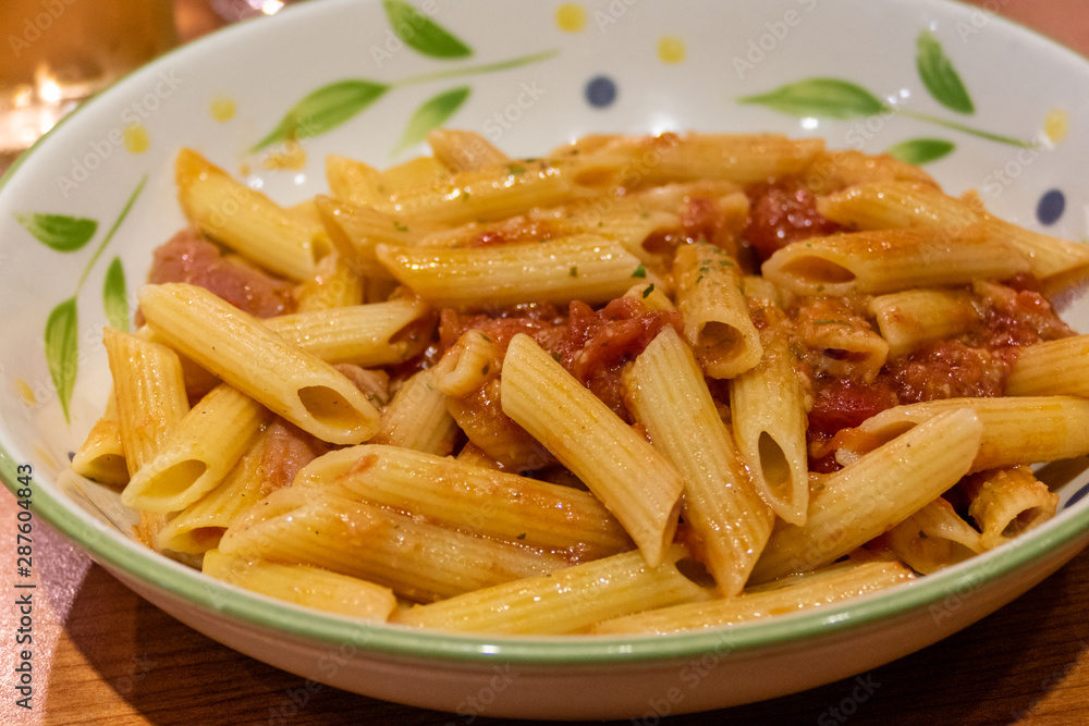 Pasta alfredo penne with tomato based sauce Pasta alfredo penne with tomato based sauce