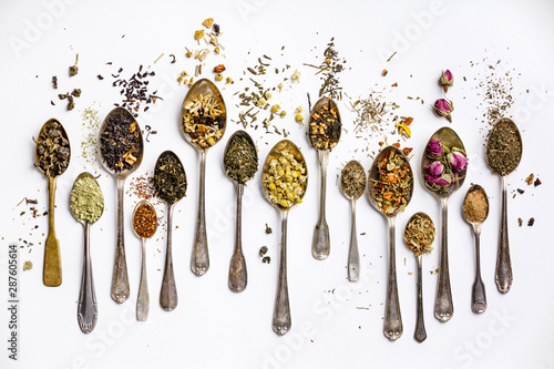 Obraz na płótnie Assortment of dry tea in vintage spoons