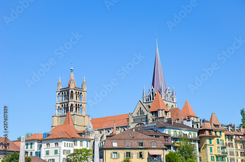 Wallpaper Mural The tower of the Cathedral of Notre Dame in Lausanne, Switzerland. Located in canton Vaud. It belongs to the Evangelical Reformed Church. Religious buildings. Gothic architecture. Religion Torontodigital.ca