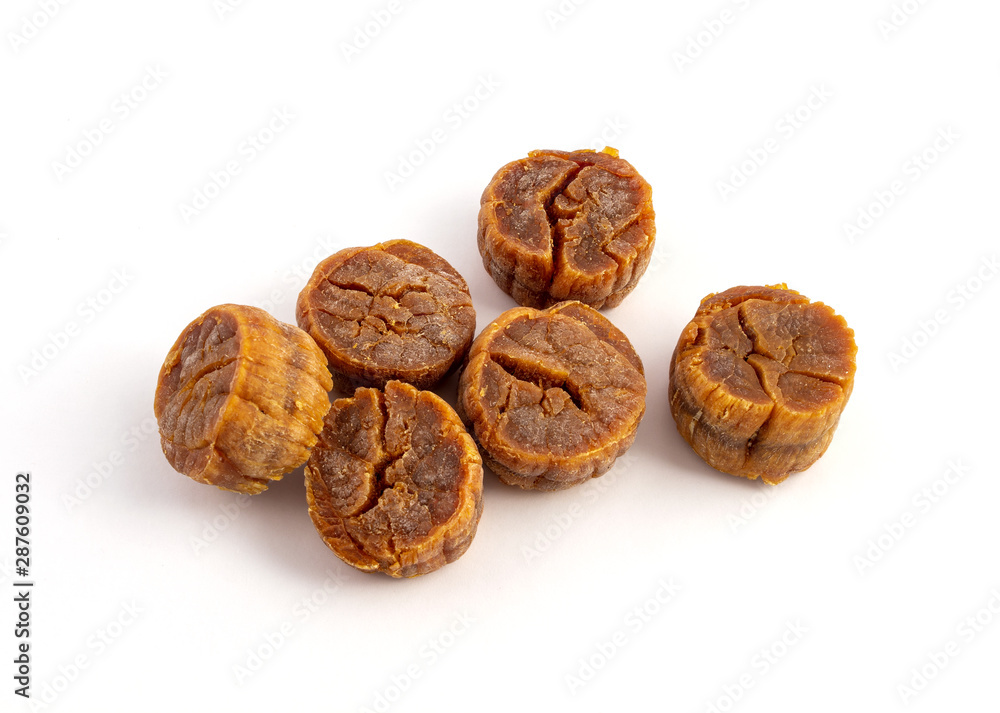 a group of dried scallops on white background a group of dried scallops on white background