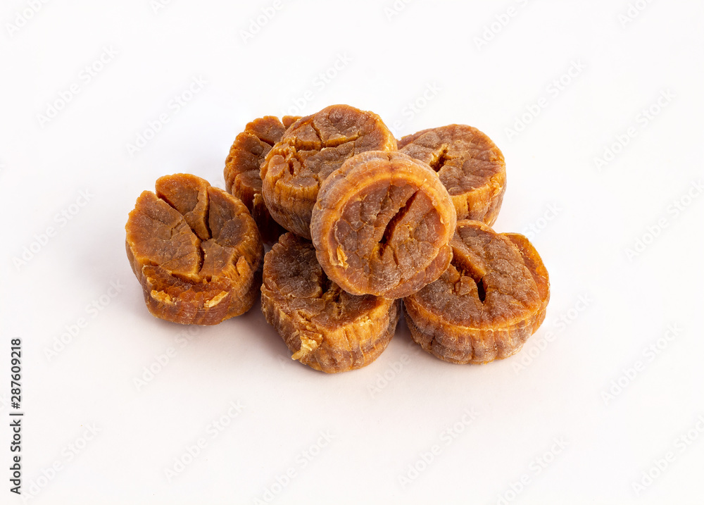 a group of dried scallops on white background a group of dried scallops on white background