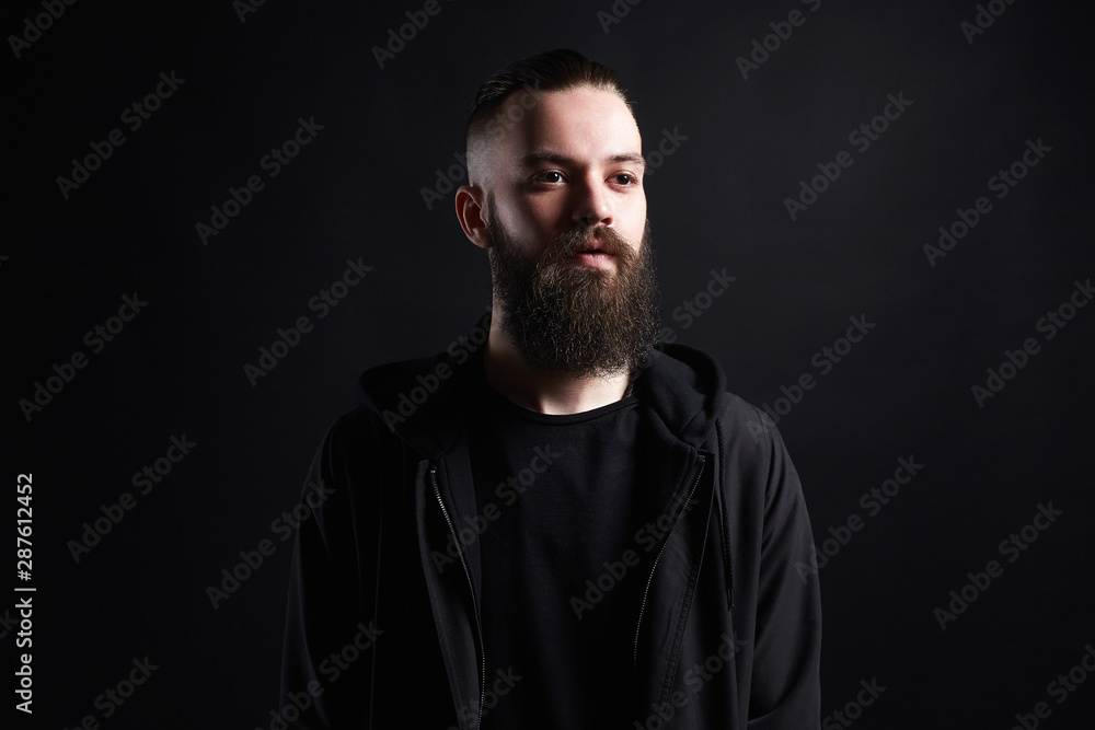 Fashionable Man over black background