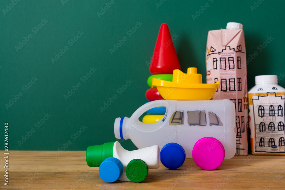 Houses and toy cars made from milk bags. DIY paper milk bag. Creative paper milk bag ideas. Recycle crafts.