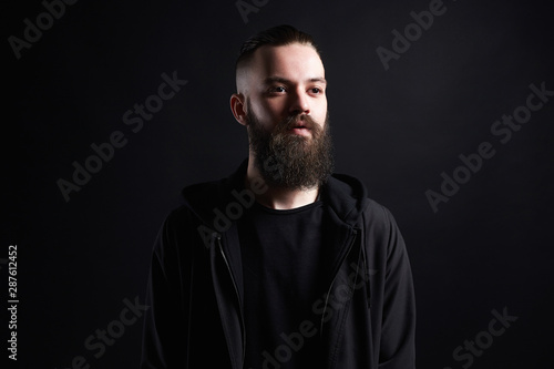Fashionable Man over black background