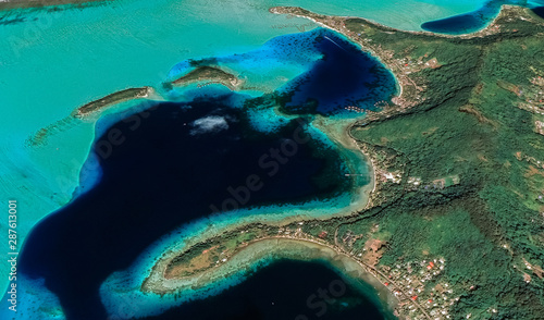 Landscape of the coast of the resort island of Bora Bora from a bird's eye view