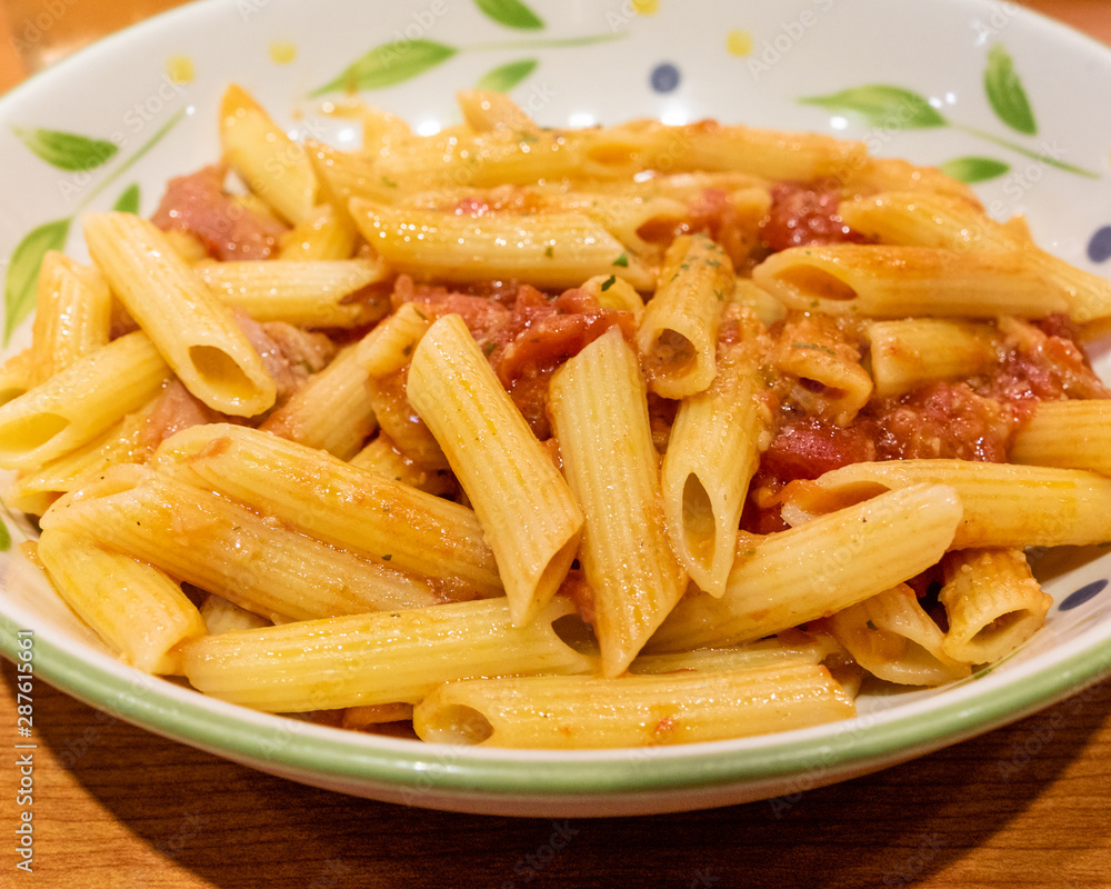 Pasta alfredo penne with tomato based sauce Pasta alfredo penne with tomato based sauce