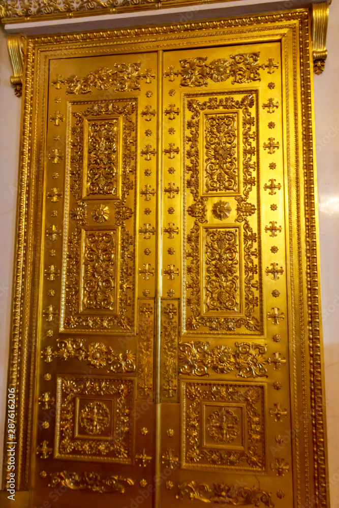 Close-up of a gilded ornate door