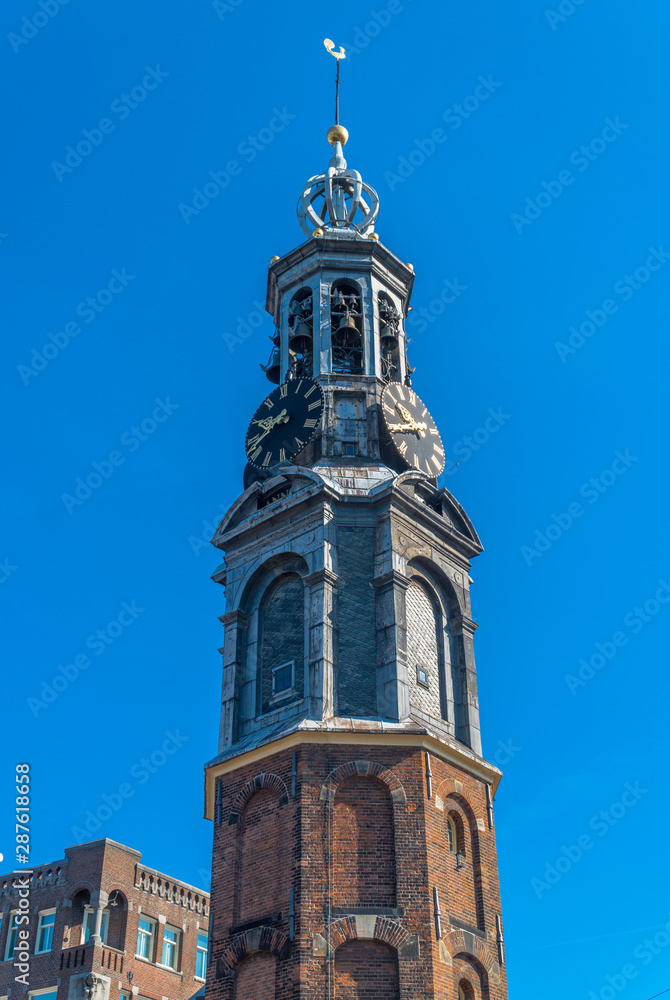 Amsterdam, North Holland / Netherlands - June 22nd, 2019: The Munttoren bell tower / Close-up