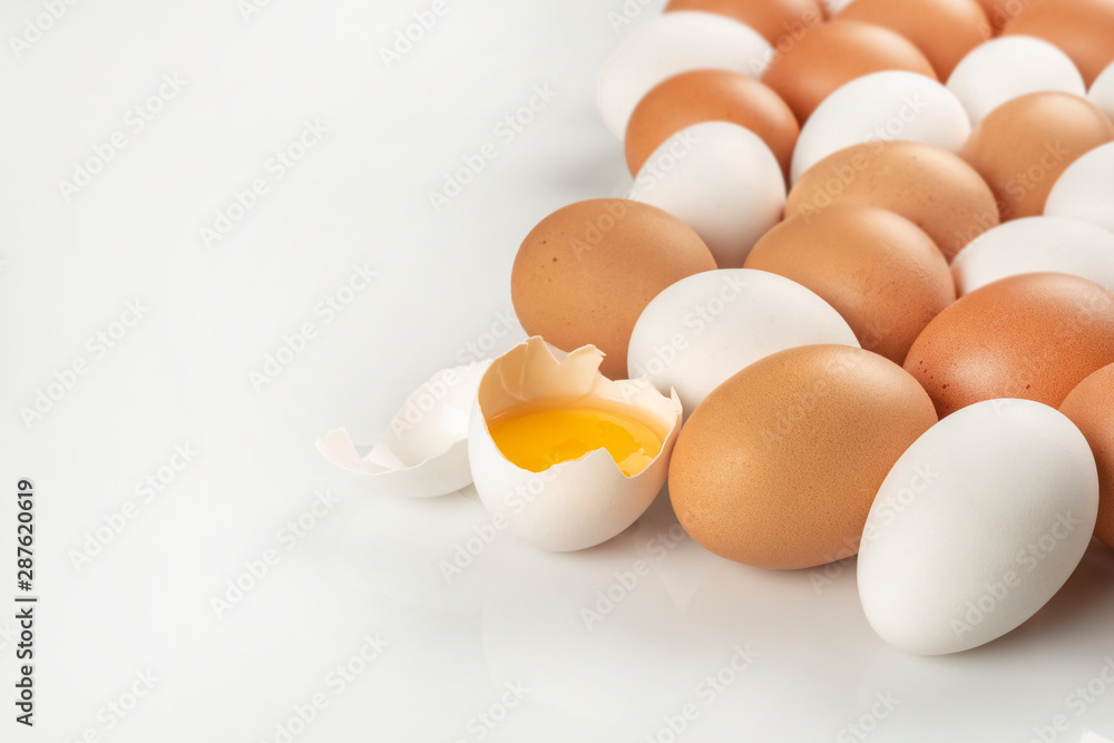 Fresh farm eggs. Brown and white colored fresh eggs Fresh farm eggs. Brown and white colored fresh eggs