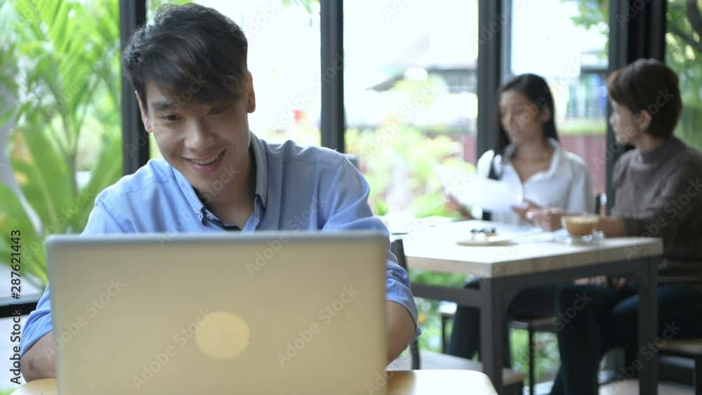 Business concepts. A businessman is working alone in a coffee shop. 4k Resolution. Business concepts. A businessman is working alone in a coffee shop. 4k Resolution.
