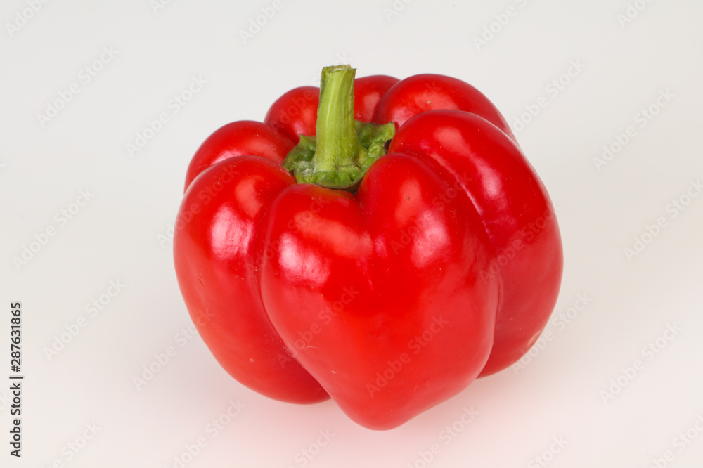 Ripe red bell pepper isolated on white Ripe red bell pepper isolated on white