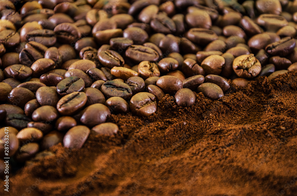 Background of ground coffee and coffee beans. Top view. Background of ground coffee and coffee beans. Top view.