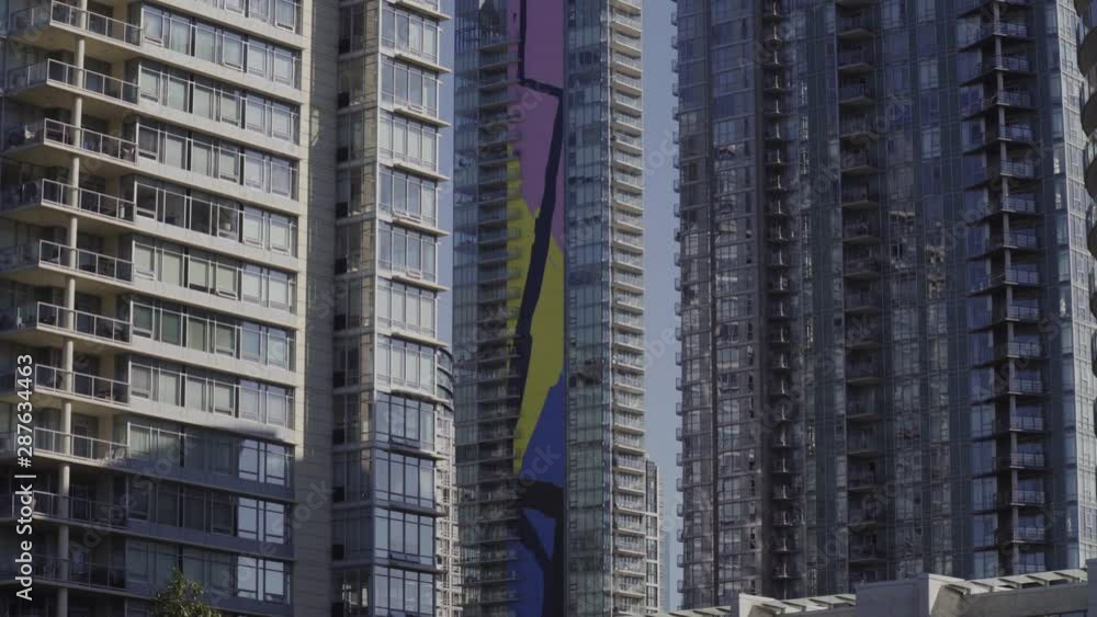 Vancouver Yaletown High rise apartments, Morning - smooth shot from moving boat in False creek, Canada Vancouver Yaletown High rise apartments, Morning - smooth shot from moving boat in False creek, Canada