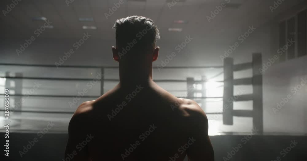 A motivated muay thai sportsman walking towards sparring ring, ready for a fight - martial arts, way to success concept 4k footage A motivated muay thai sportsman walking towards sparring ring, ready for a fight - martial arts, way to success concept 4k footage