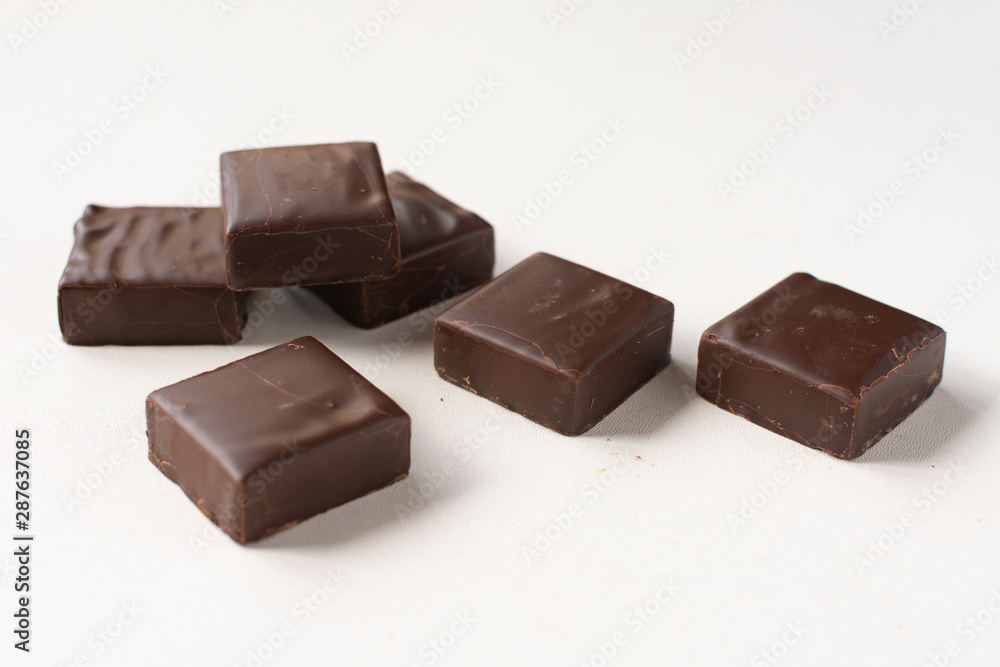 Chocolate candies on a white background. Chocolate candies on a white background.