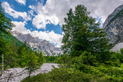 Triglav national natural Park in Slovenia, Pisnica valley. Hiking trails for tourists. Beautiful mountain landscape in the Julian Alps. photo