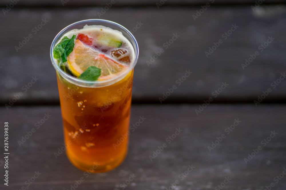 Pimm cocktail on wooden table Pimm cocktail on wooden table