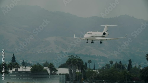 Wallpaper Mural Private VIP luxury jet airplane landing at the airport, no tail or identification number. 60 FPS Slow Motion, 4K RAW graded footage Torontodigital.ca