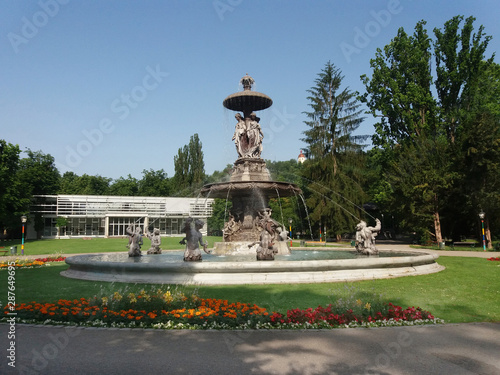 Fountain in the city park Stadtpark, a green island in the middle of the city, in Graz, Styria region, Austria. 