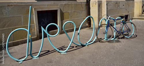 Bicycle stand in the shape of the inscription Dream. Bratislava.